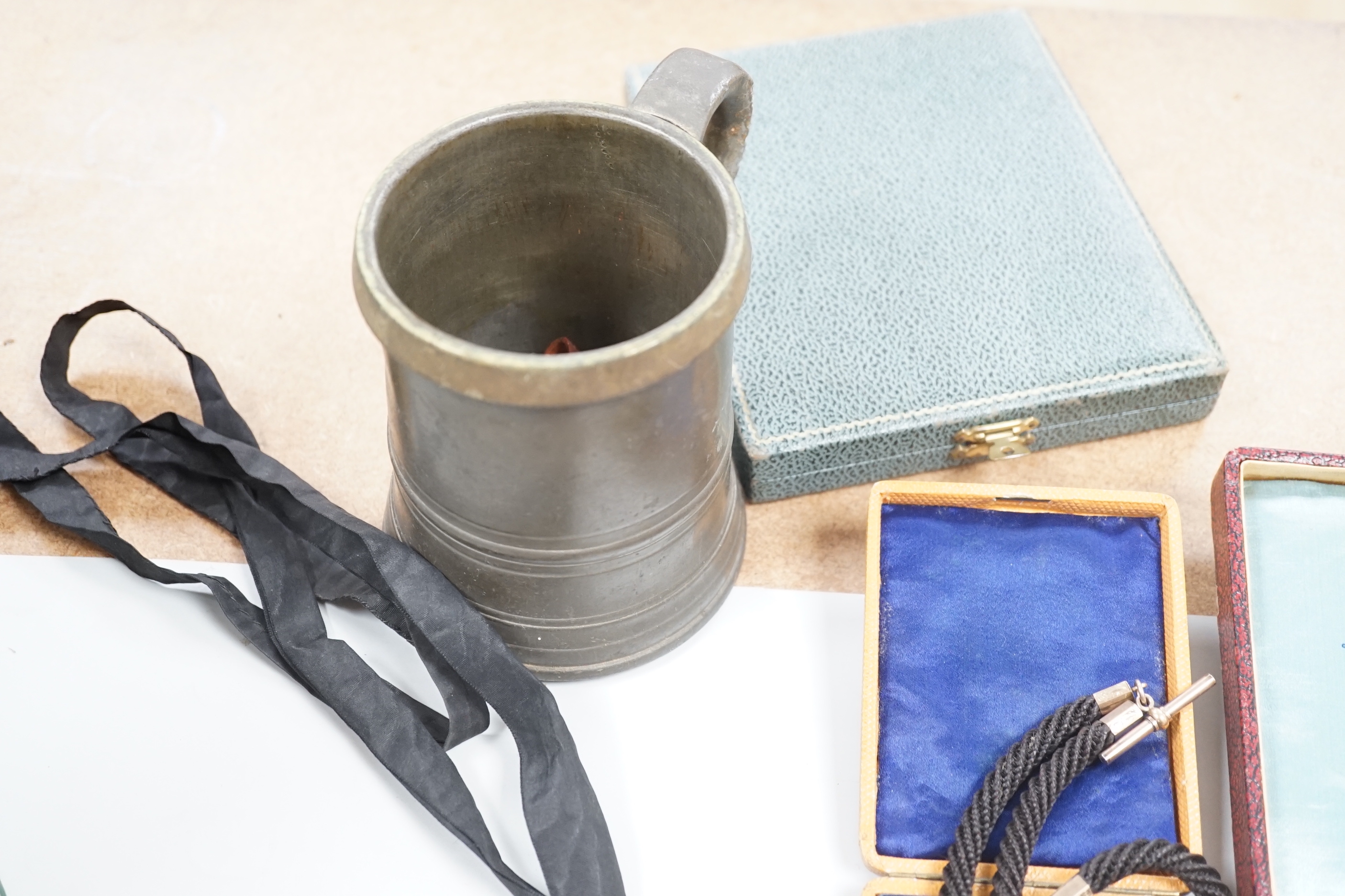 A group of 19th century and later collectibles to include a silver plated presentation padlock and key, a silver hunter pocket watch, french snuff box, etc.